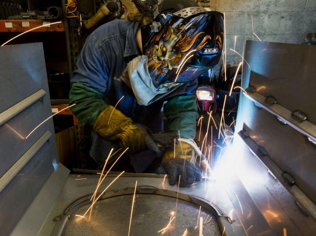 Image-of-a-welder-welding.